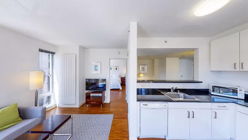 Modern kitchen with stainless steel appliances at 1188 Mission Apartments in San Francisco