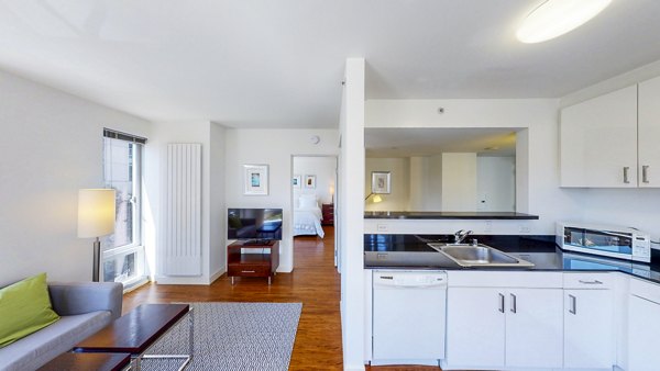 Modern kitchen with stainless steel appliances at 1188 Mission Apartments in San Francisco