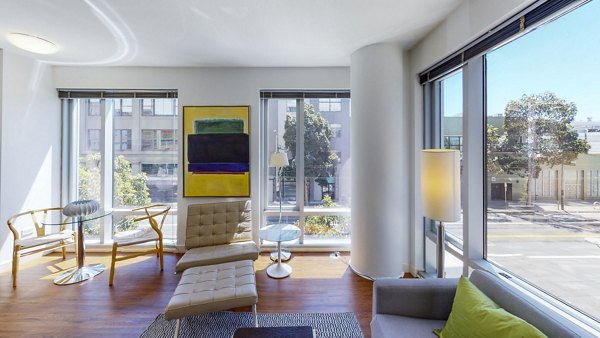 Cozy living room with modern furnishings in 1188 Mission Apartments, San Francisco, offering luxury features and stylish design for urban living