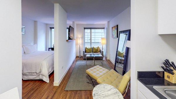 Contemporary living room with modern decor at 1188 Mission Apartments