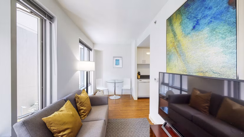 Spacious living room with modern decor at 1188 Mission Apartments