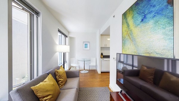 Spacious living room with modern decor at 1188 Mission Apartments