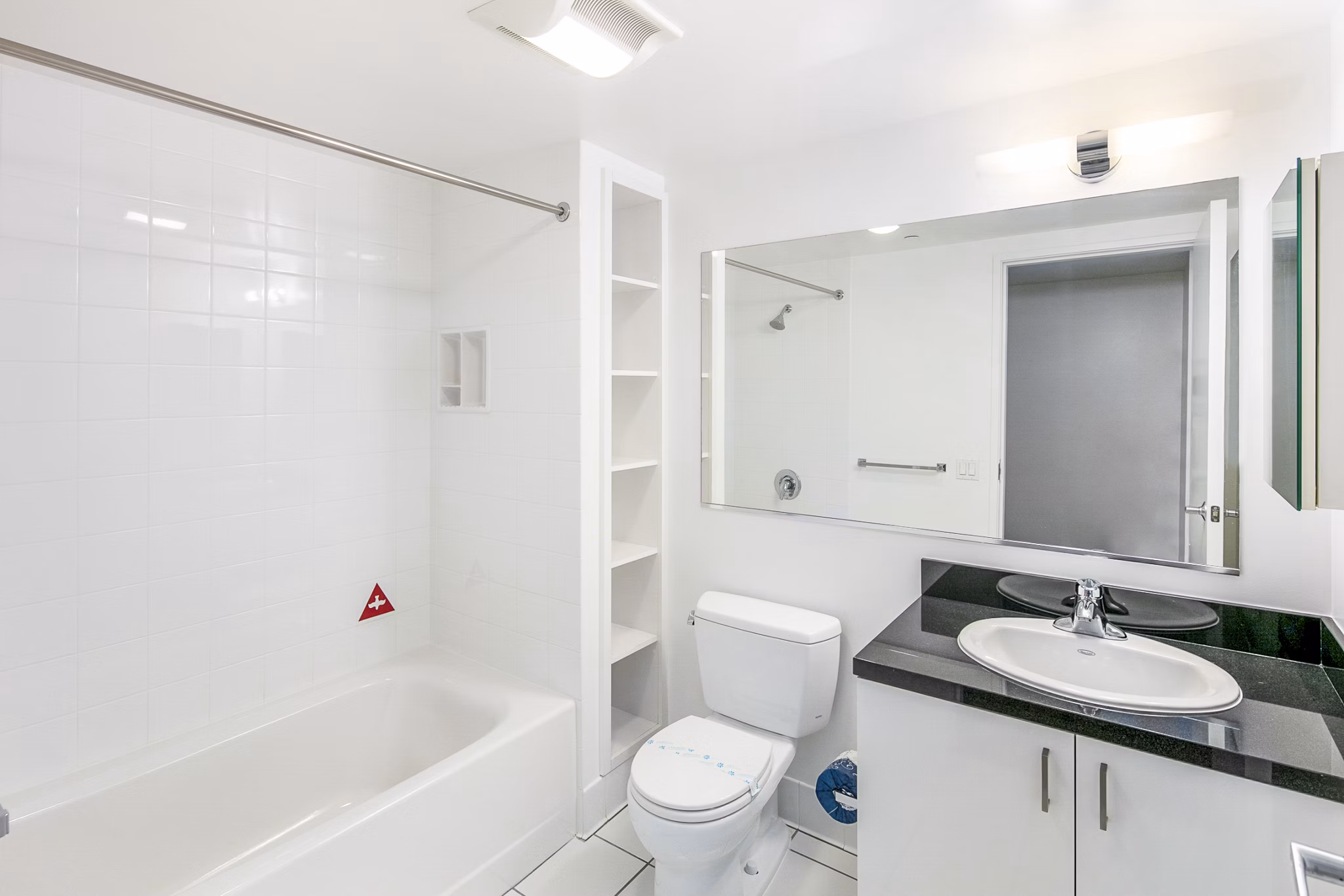 Bathroom featuring modern fixtures and sleek design at 1190 Mission Apartments