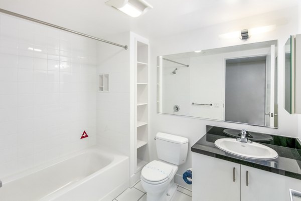 Bathroom featuring modern fixtures and sleek design at 1190 Mission Apartments