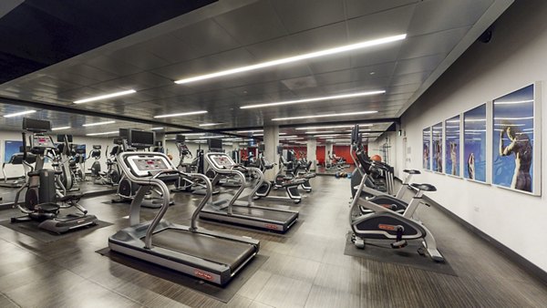 Fitness center with modern equipment at 1190 Mission Apartments