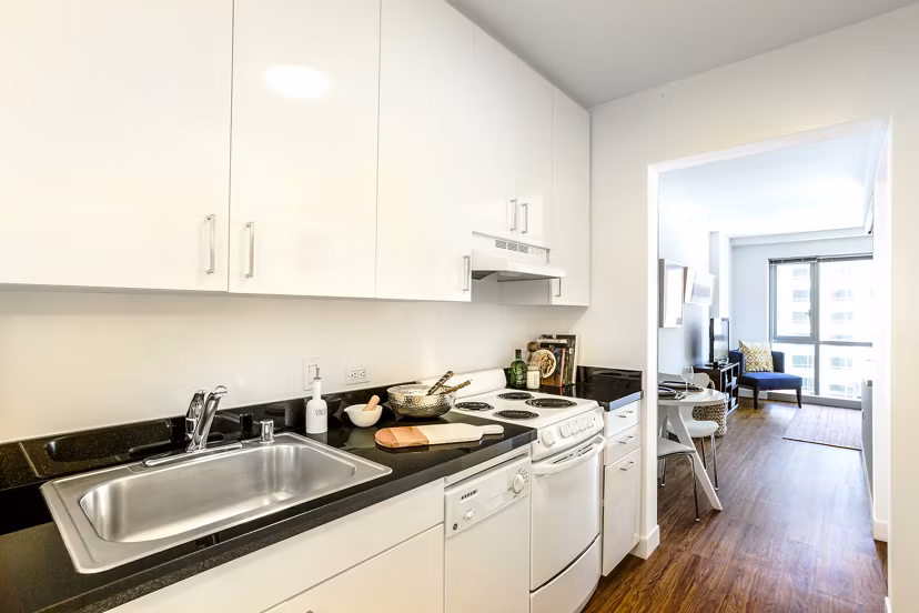 Sleek kitchen with stainless steel appliances in 1190 Mission Apartments, luxury living in the heart of San Francisco