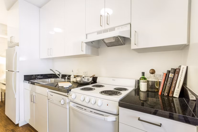 Modern kitchen with stainless steel appliances at 1190 Mission Apartments, a Greystar luxury community in San Francisco