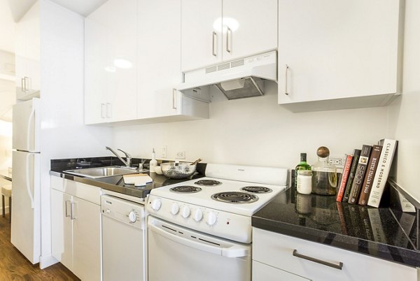 Modern kitchen with stainless steel appliances at 1190 Mission Apartments, a Greystar luxury community in San Francisco