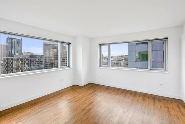 Spacious living room with modern decor at 1190 Mission Apartments in San Francisco