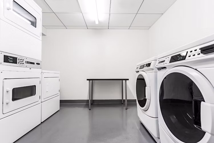 Laundry facility with advanced equipment at 1190 Mission Apartments