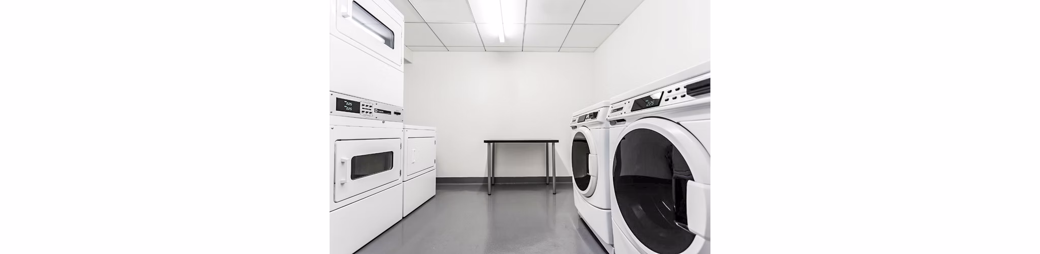 Laundry facility with advanced equipment at 1190 Mission Apartments