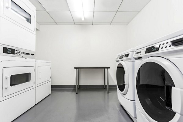 Laundry facility with advanced equipment at 1190 Mission Apartments