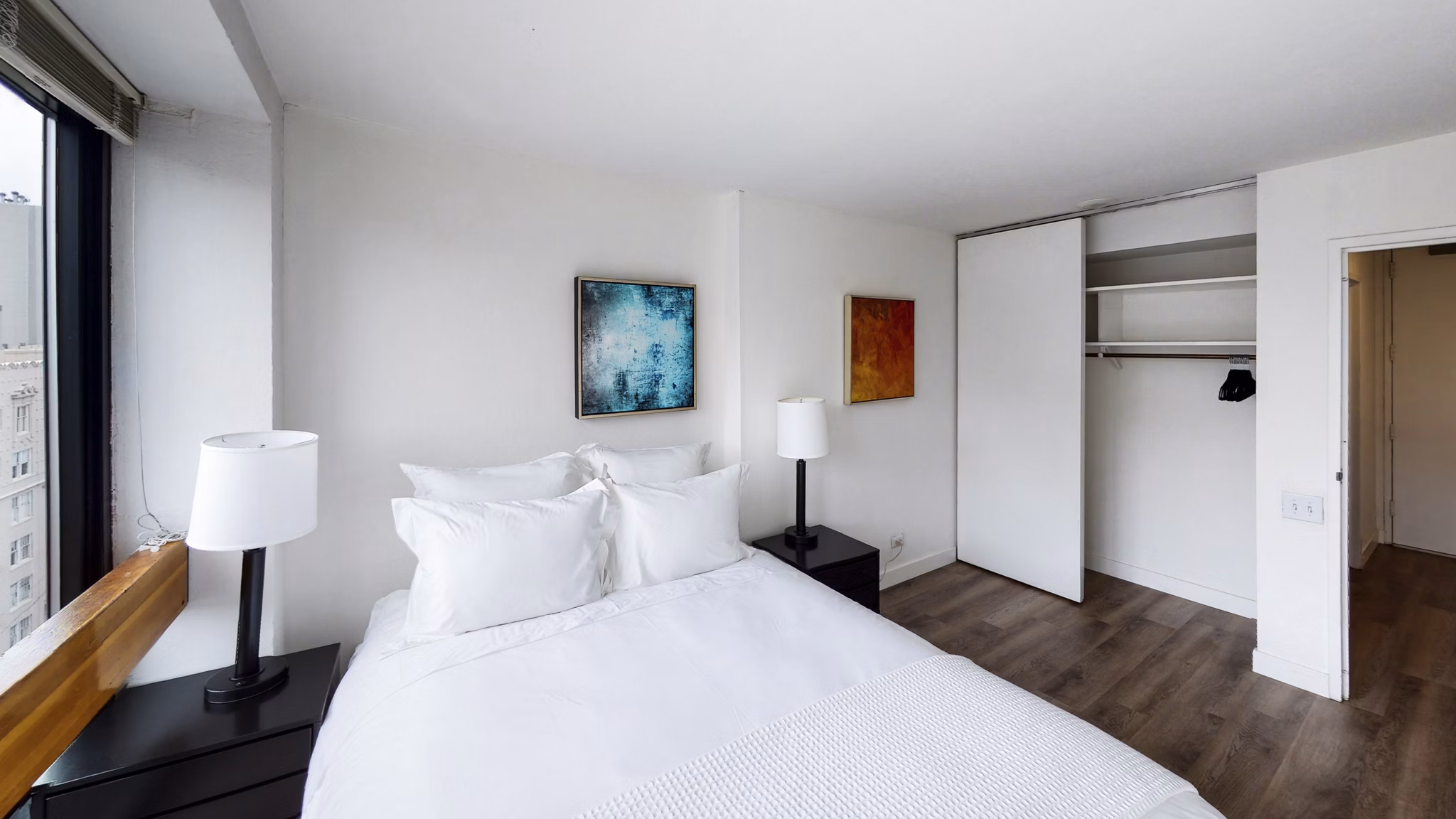 Cozy bedroom with modern furnishings in 2000 Broadway Apartments