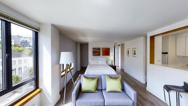Bedroom with elegant design elements at 2000 Broadway Apartments, a luxury property managed by Greystar