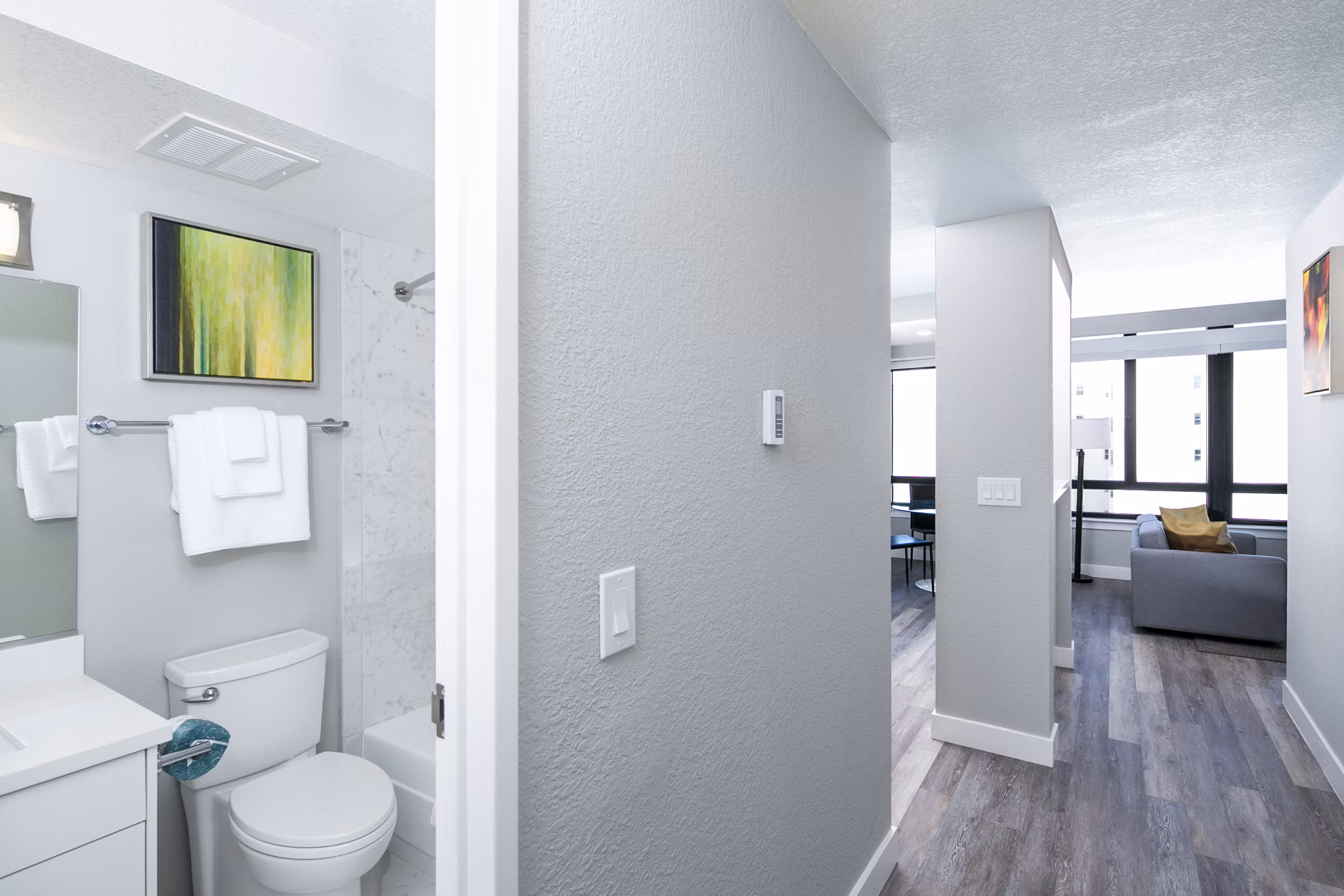 Bathroom with sleek fixtures and modern design at 2000 Broadway Apartments
