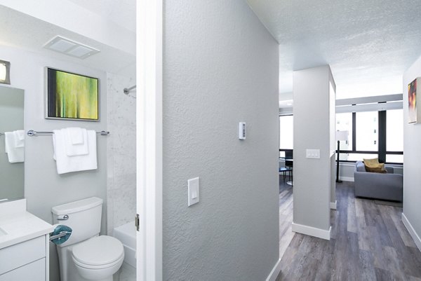 Bathroom with sleek fixtures and modern design at 2000 Broadway Apartments