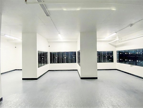 Mailroom with secure package lockers at 2000 Broadway Apartments