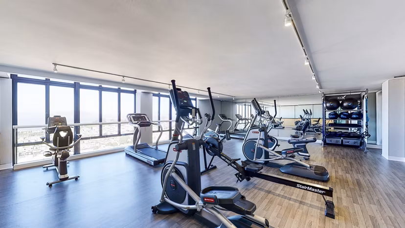 Modern fitness center with state-of-the-art equipment at 2000 Broadway Apartments