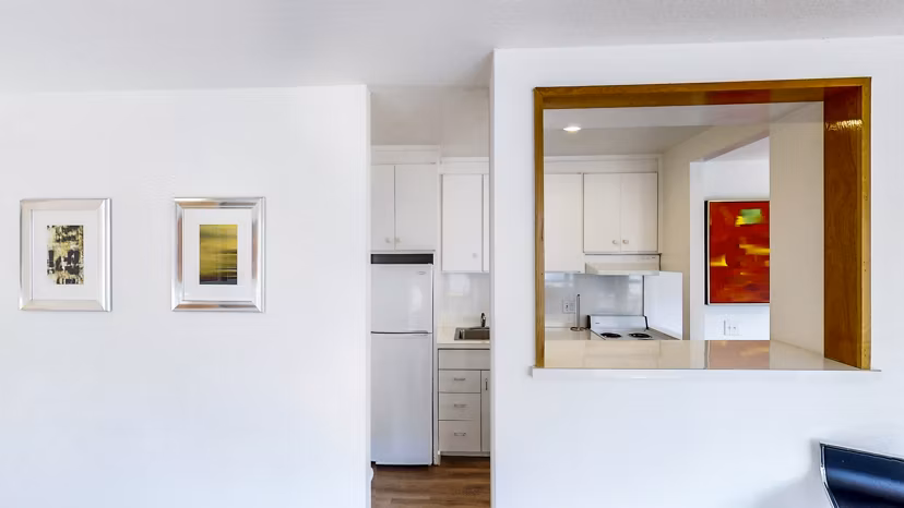 Modern kitchen with stainless steel appliances in 2000 Broadway Apartments luxury building
