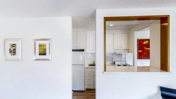 Modern kitchen with stainless steel appliances in 2000 Broadway Apartments luxury building