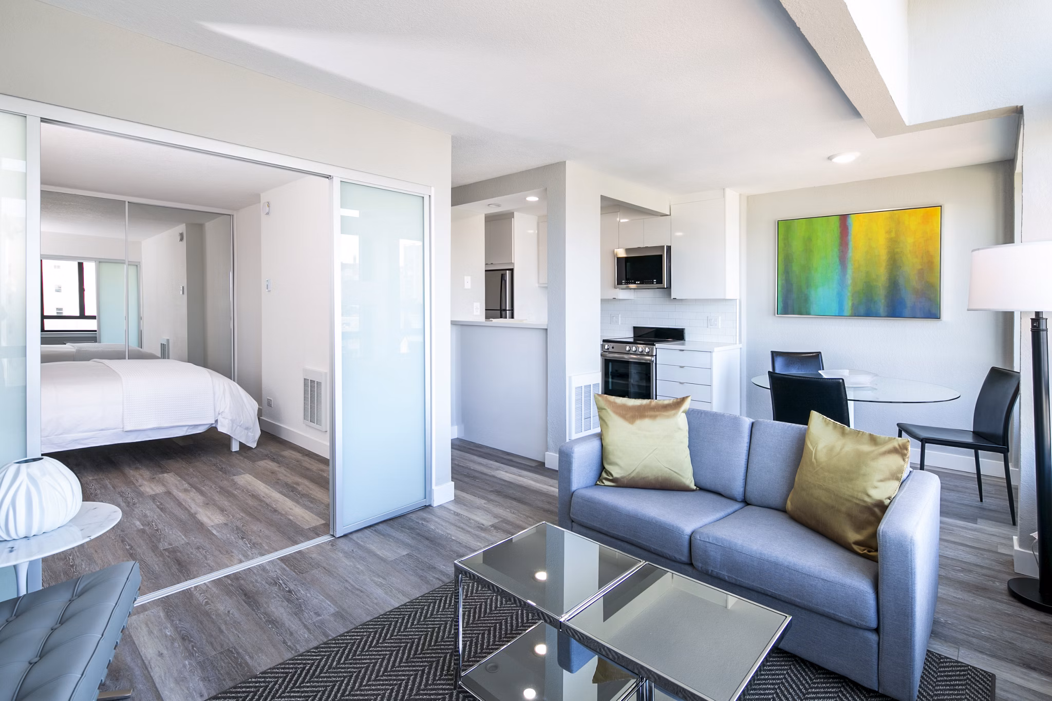 Spacious living room with modern furnishings at 2000 Broadway Apartments