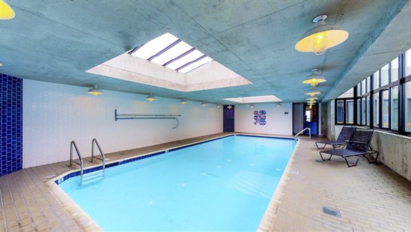 Expansive outdoor pool at 2000 Broadway Apartments offering luxury relaxation