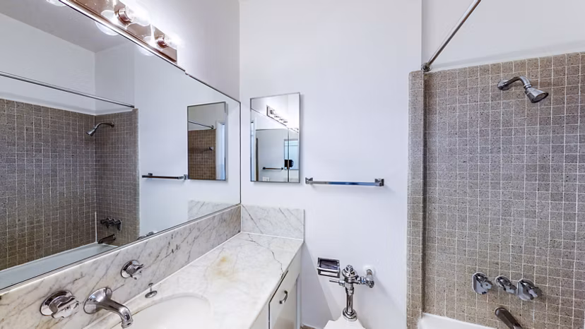 Contemporary bathroom with sleek fixtures at 2133 Stockton Apartments