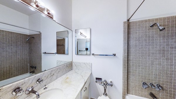 Contemporary bathroom with sleek fixtures at 2133 Stockton Apartments