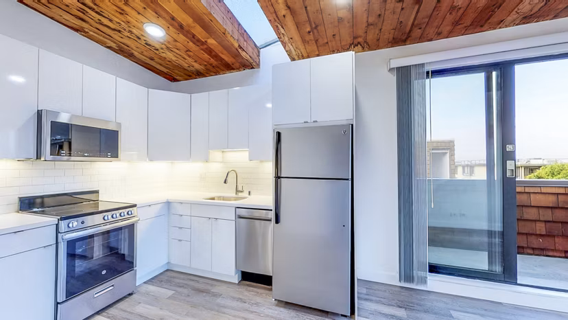 Modern kitchen with sleek finishes at 2133 Stockton Apartments, luxury living in a Greystar community