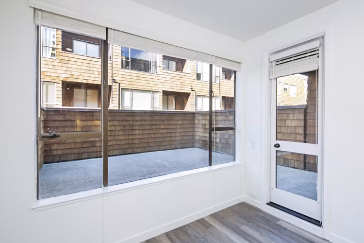 Modern patio with comfortable seating at 2133 Stockton Apartments, perfect spot for relaxation and city views
