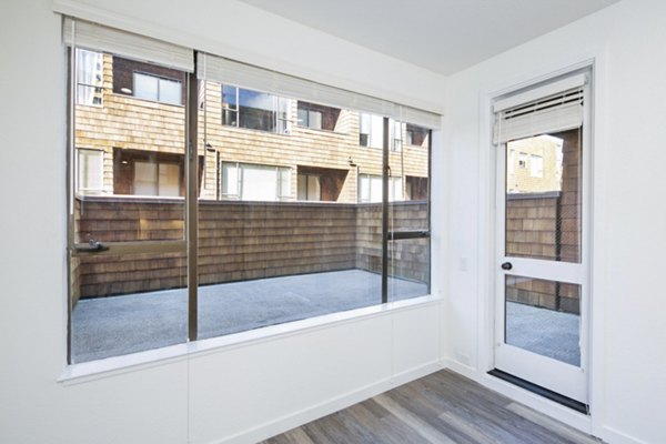 Modern patio with comfortable seating at 2133 Stockton Apartments, perfect spot for relaxation and city views