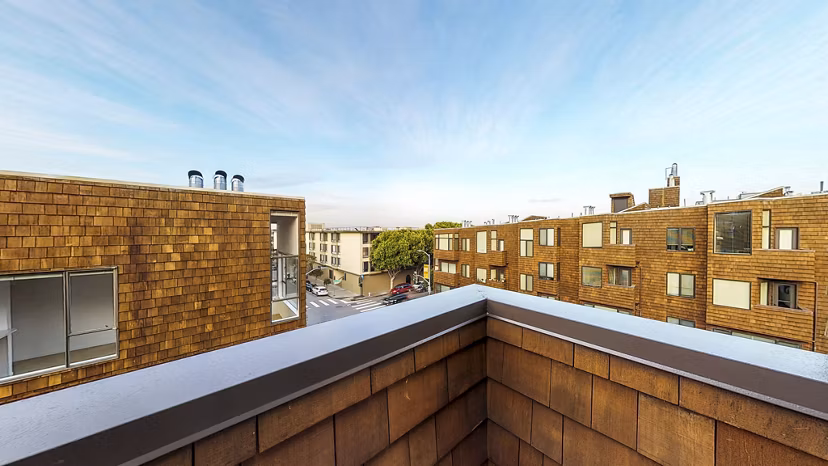 Stylish patio balcony with city views at 2133 Stockton Apartments