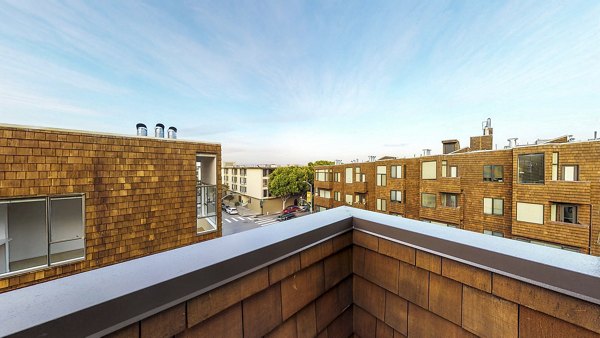 Stylish patio balcony with city views at 2133 Stockton Apartments