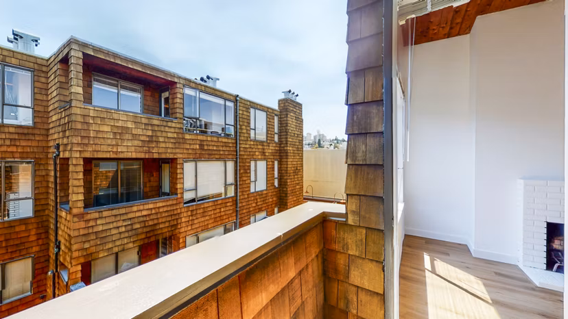 Cozy patio with outdoor seating at 2133 Stockton Apartments, ideal for enjoying fresh air and dining al fresco