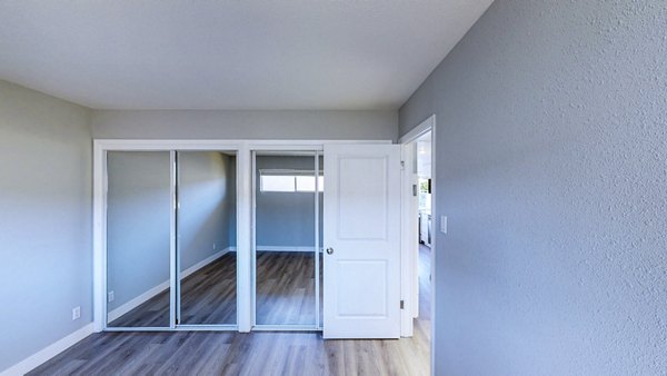 Contemporary bedroom with stylish decor at 230 Dolores Apartments