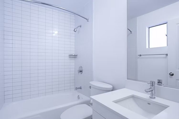 Bathroom featuring sleek fixtures and modern design at 230 Dolores Apartments in San Francisco