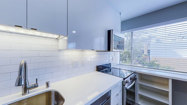 Kitchen featuring modern appliances and sleek countertops at 230 Dolores Apartments, a Greystar luxury property in downtown San Francisco