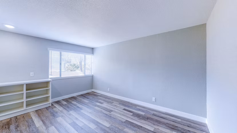 Spacious living room with modern decor and natural light at 230 Dolores Apartments, a Greystar luxury apartment