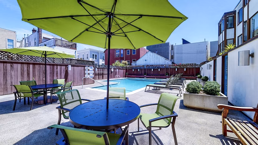 Modern pool and patio area at 230 Dolores Apartments offering luxury relaxation in a vibrant urban setting