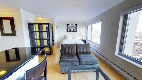 Cozy bedroom with modern decor at Clay Park Tower Apartments, luxury living space with stylish furnishings and ample natural light