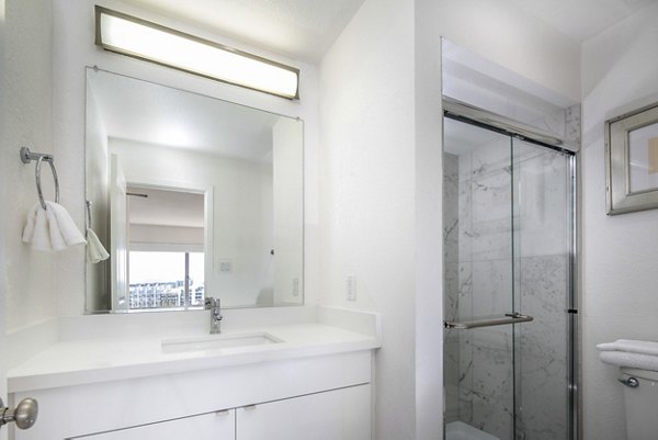 Bathroom with modern fixtures and neutral tones at Clay Park Tower Apartments