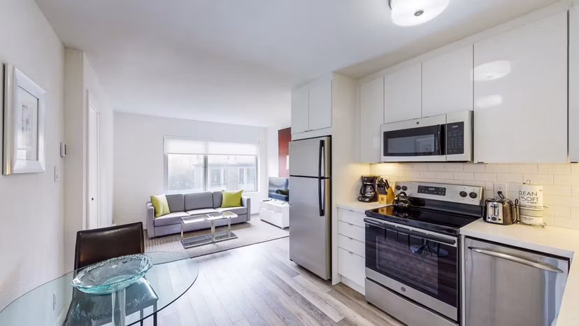 Modern kitchen with stainless steel appliances at Clay Park Tower Apartments