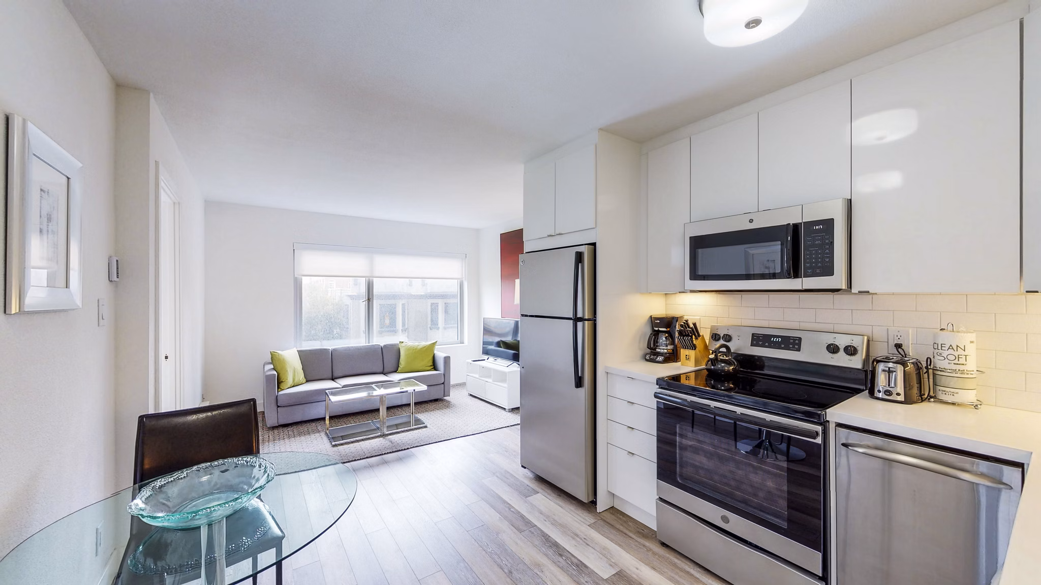 Modern kitchen with stainless steel appliances at Clay Park Tower Apartments