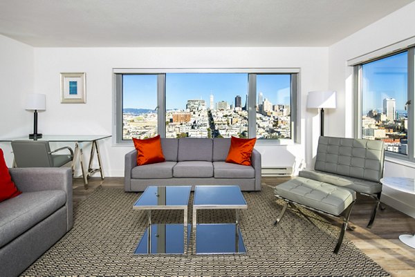 Spacious living room with modern decor in Clay Park Tower Apartments
