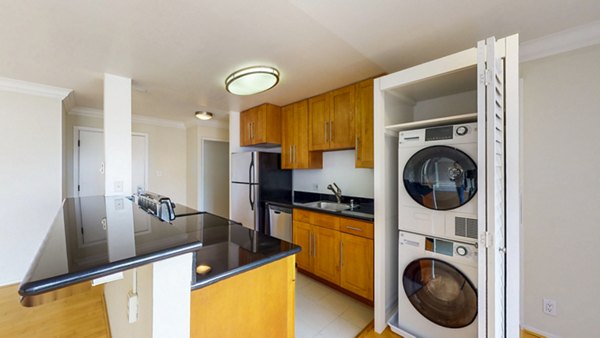 kitchen and laundry room at Clay Park Tower Apartments