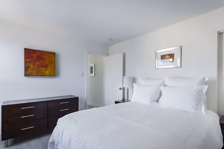 Luxurious bedroom with elegant furnishings at Crystal Tower Apartments