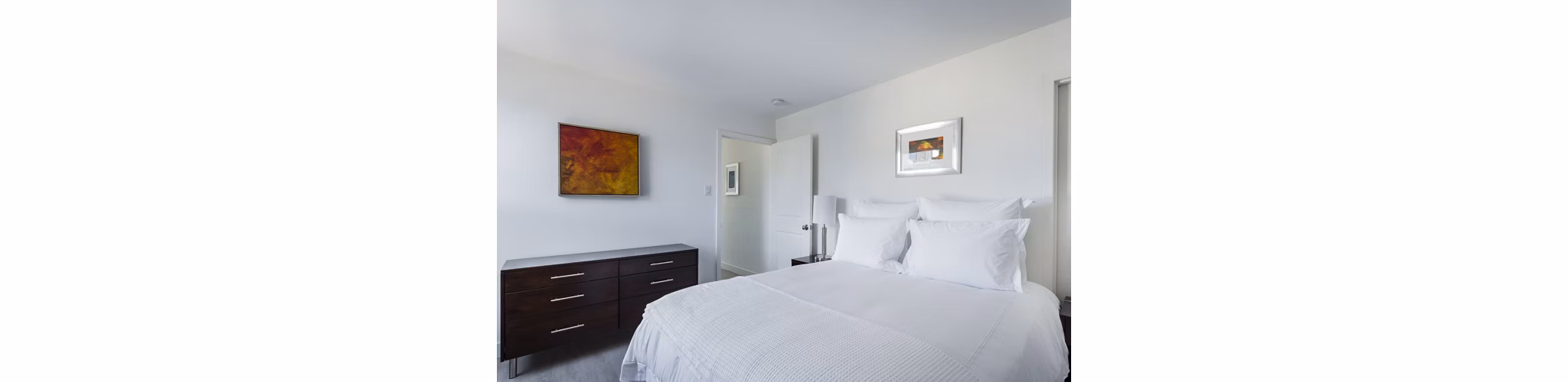 Luxurious bedroom with elegant furnishings at Crystal Tower Apartments
