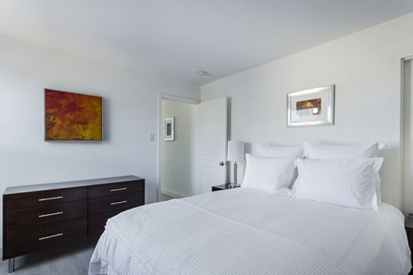 Luxurious bedroom with elegant furnishings at Crystal Tower Apartments