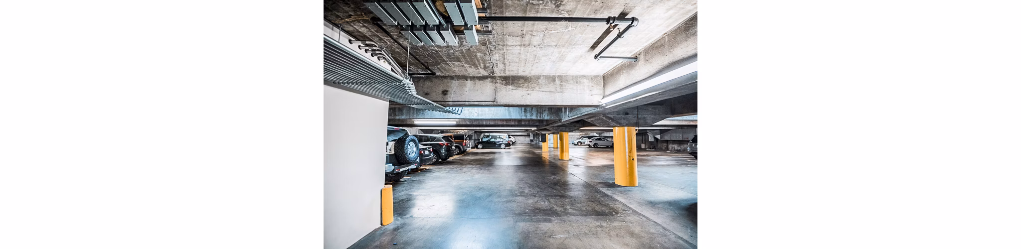 Garage with covered parking at Crystal Tower Apartments, featuring secure and convenient access for residents' vehicles