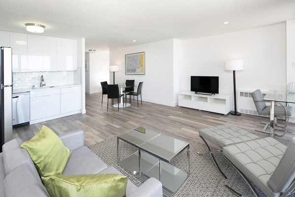 Spacious living room with modern decor at Crystal Tower Apartments luxury community